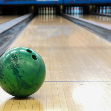 Bowling oil patterns begin after the dots on the floor and the horizontal line that connects the gutters. Crossing the horizontal line is not safe.