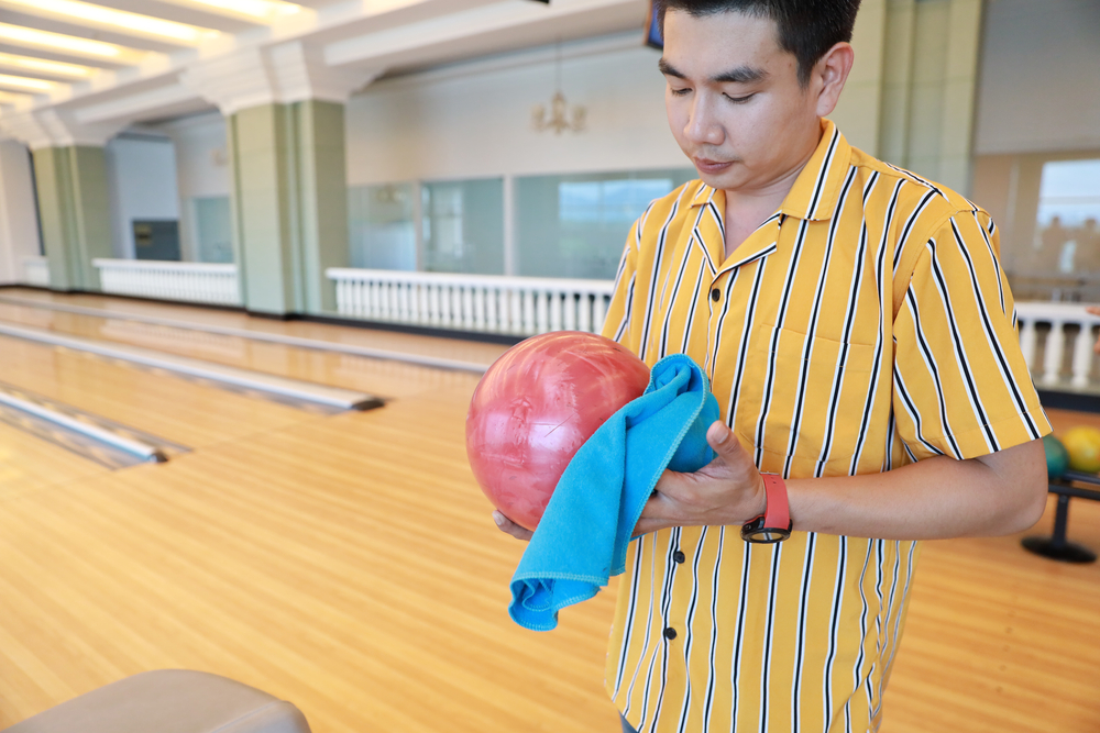 Wiping off the ball surface with a towel and a ball cleaner is basic maintenance for your bowling ball.