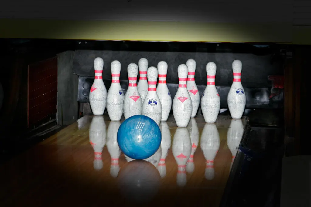 Ten pins bowling lanes at a bowling alley.
