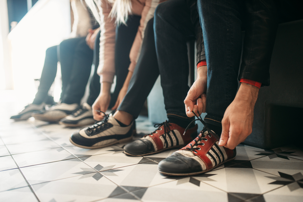 Bowling alley players that bowl regularly looking for a good pair of shoes with sliding soles that come in half sizes.