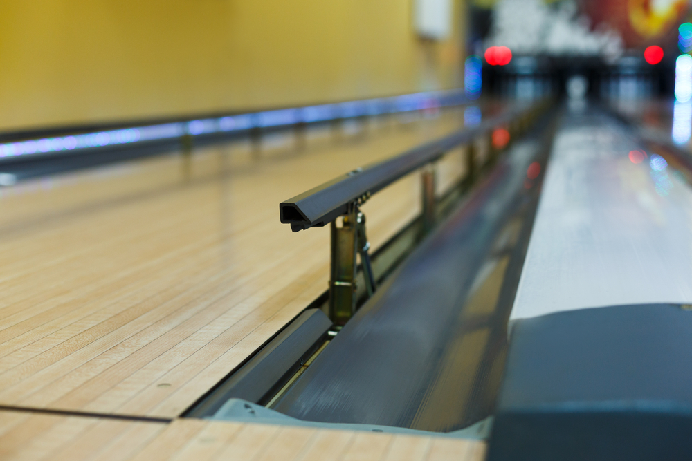 This image shows an upclose look at automated bumpers on a lane.
