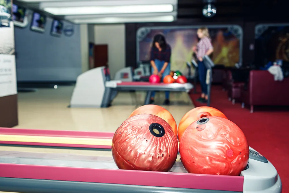 Four non-plugged balls where each one has a plastic bowling ball coverstock, like most used bowling balls.