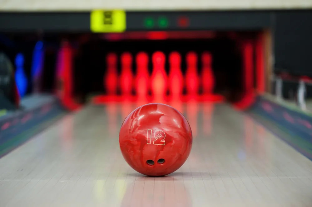 #12 red house ball with a plastic ball surface - these balls are alleys to avoid drilling bowling balls for various people.