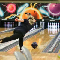 A professional (PBA) bowler at Birmingham's local bowling center playing in a weekly bowling exhibitions tournament.