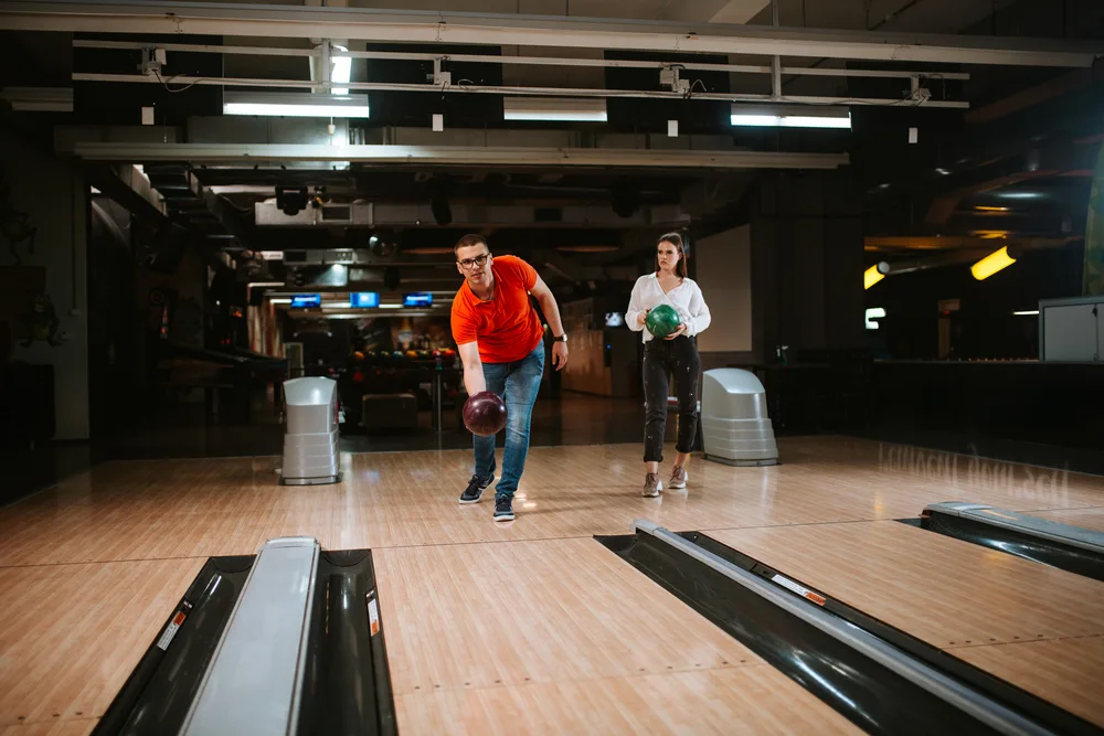 A bowling team using reactive bowling balls with a urethane coverstock and microcell polymer technology.