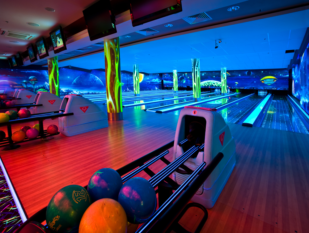 Bowling establishmnets offer bother traditional bowling and cosmic bowling lanes. Providing a cosmic bowling environment, there are glow in the dark lights of neon green and glowing lanes.