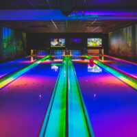 To get the full cosmic bowling experience with laser lights, disco lights and neon lights, a colorful bowling evening at a local alley is important.