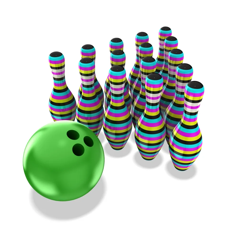A green plastic bowling ball that isn't the same volume as a reactive ball with multi-colored pins.