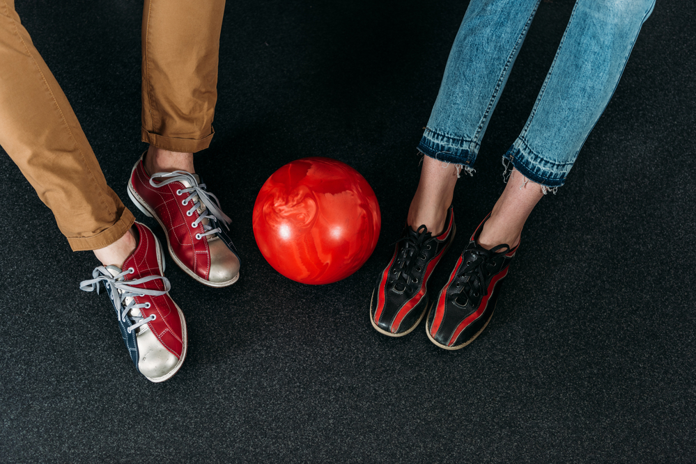 Two pairs of bowling shoes were washed in a laundry machine. If you decide to wash bowling shoes, be sure to inspect the leather, use a soft brush to avoid leather flaking.