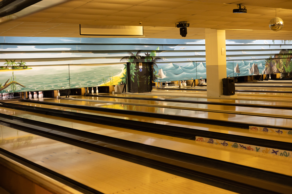 The polished diy bowling lane has a new bowling alley feel with the latest posts added and will provide a great bowling experience with painted scenery on the walls.
