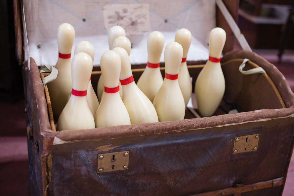 A miniature set of bowling pins that can be given to someone on a special occasion.