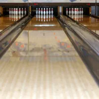 A certified bowling center standard length lane and gutter dimensions as established by the United States Bowling Congress. This is a typical lane used by ongoing and upcoming leagues in the area.