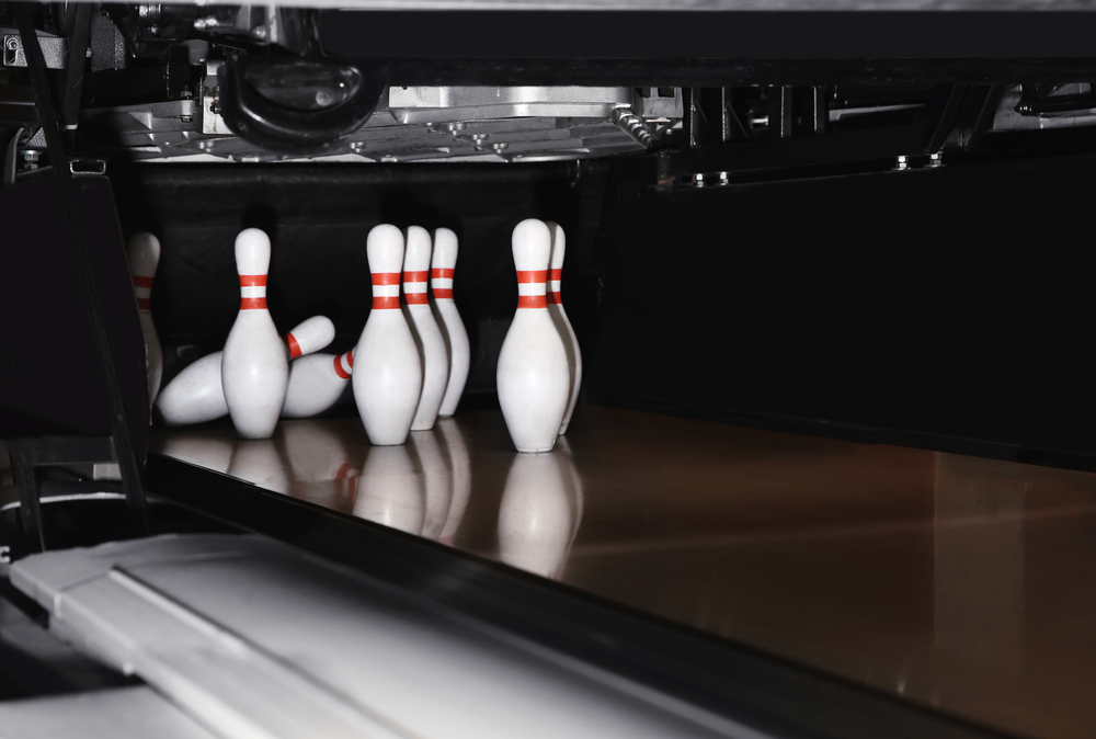 Three pins were knocked down, and the bowler achieved a spare, and on their next roll, they will have bonus points of however number of pins are knocked over on the first roll of the next frame.
