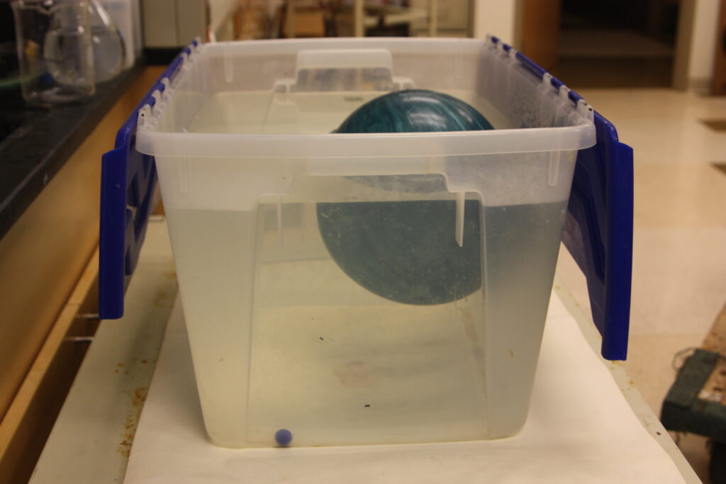 A new bowler lets their ball sit and soak in a cleaning liquid for 60 minutes, and then it will air dry.