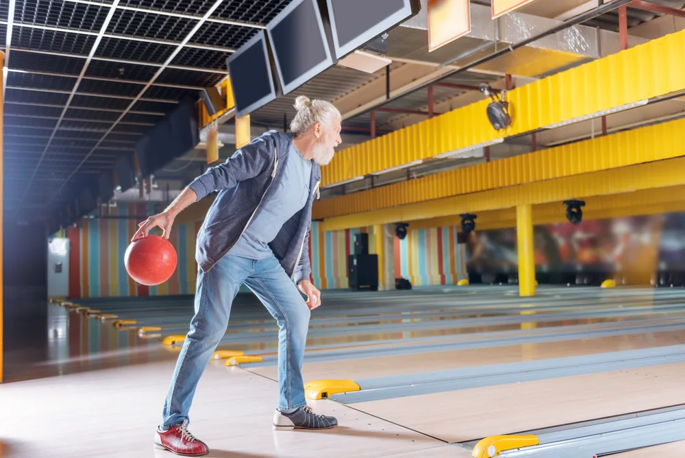 A nice older man participating in his favorite strenuous activity and exercise following a recent medical treatment.