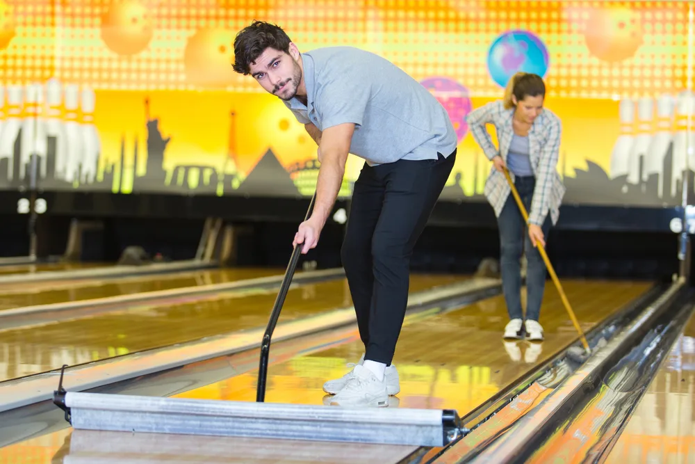 To keep the bowling alleys as competitive environments, each team helps to keep their areas clean.