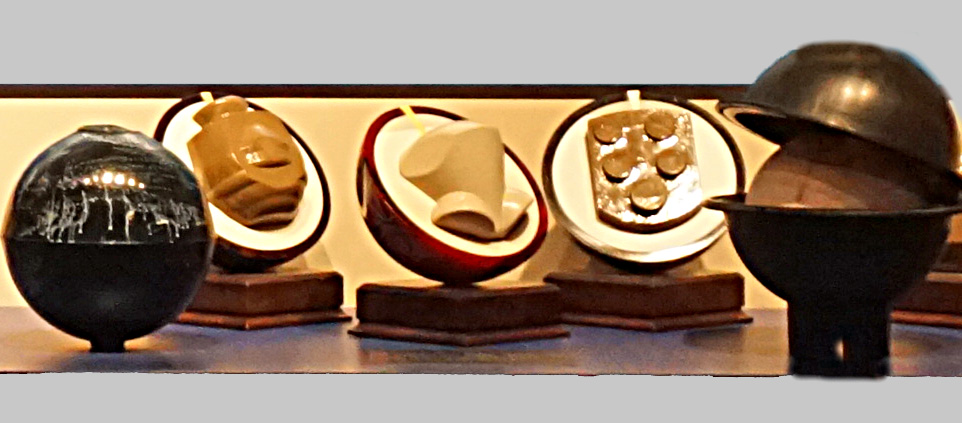 Bowling balls cut in half, showing the different shaped weights that make asymmetric balls
