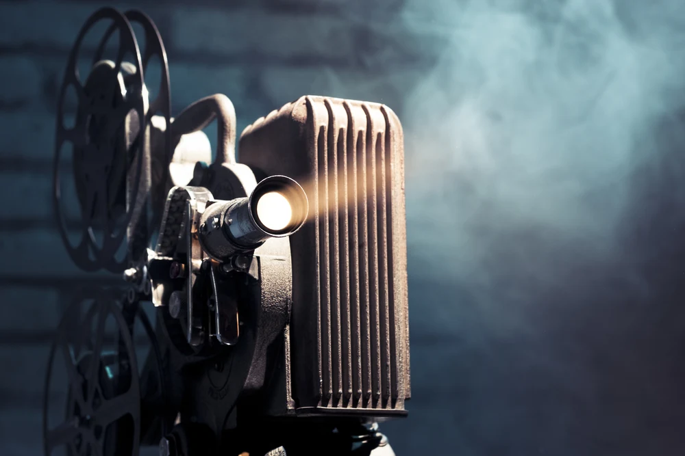 Movie projector equipment used to show their favorite bowling movie.