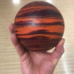 Duckpin bowling ball in hand