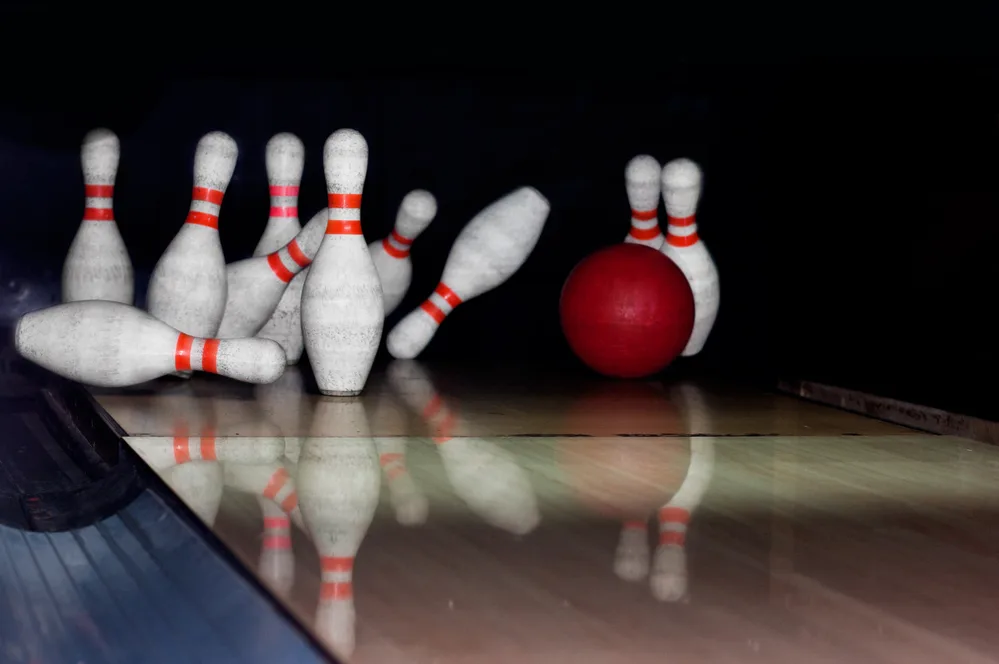 The bowler knocked down all pins in the most consecutive games they'd ever played.