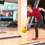 Improve your bowling score by improving your stance, approach and release