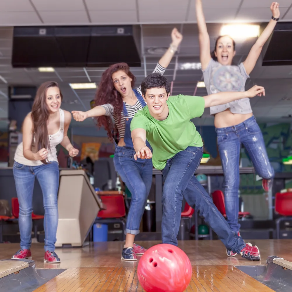 When the bowler in the green shirt released the bowling ball, he used his arm muscles.