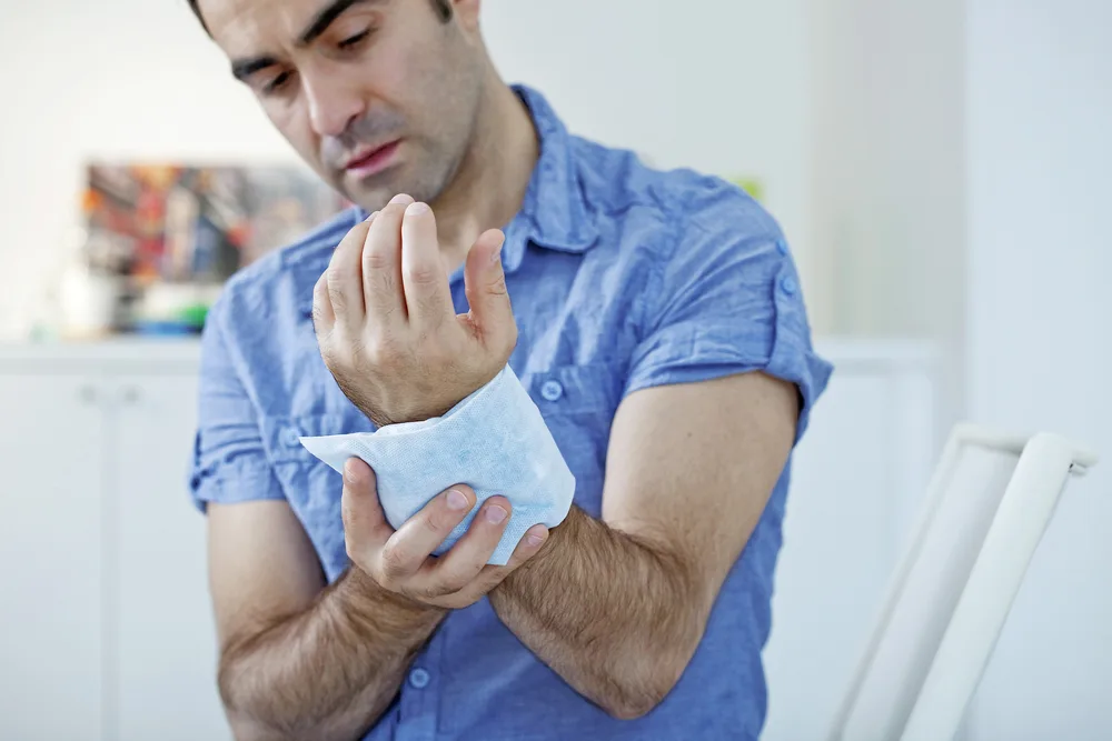 The bowler put repetitive stress on their wrist and now has to put ice on it.