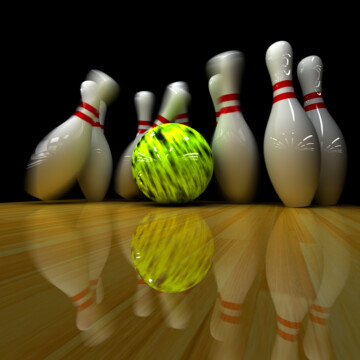 Fast bowling ball hitting pins