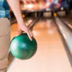 Bowler studying the lane