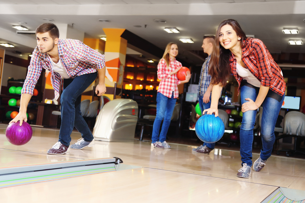 Friends playing in bowling club decides to use bowling as a mental stress reliever