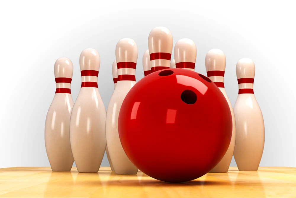 Illustration of image of bowling pins and rubber bowling ball on wooden floor