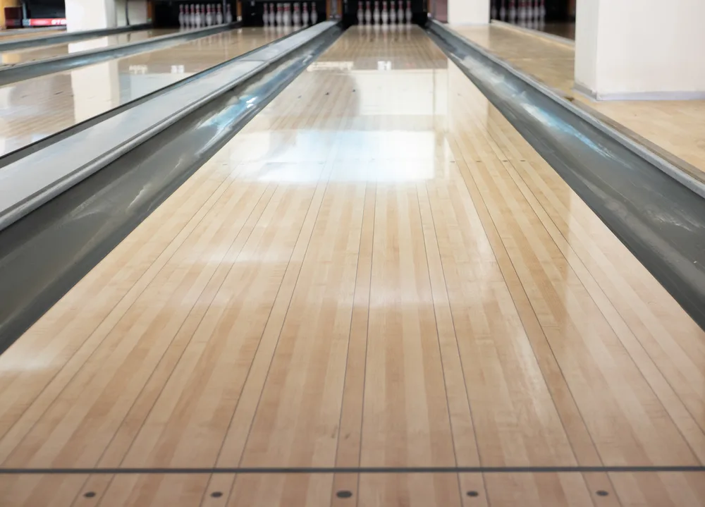 Close-up of the bowling lane at with a shine surface
