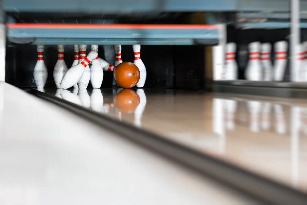 Bowling ball encounters the pins in handicap leagues