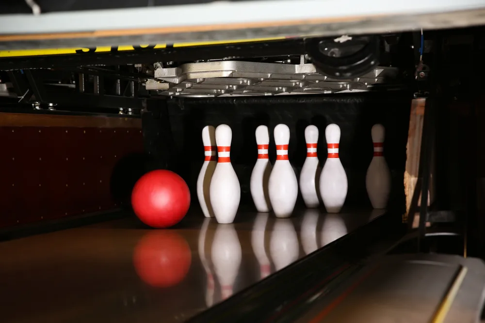 Balls and pins on alleys in bowling centers are expected bowling industry business costs.