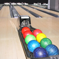 article about what makes bowling lanes slippery