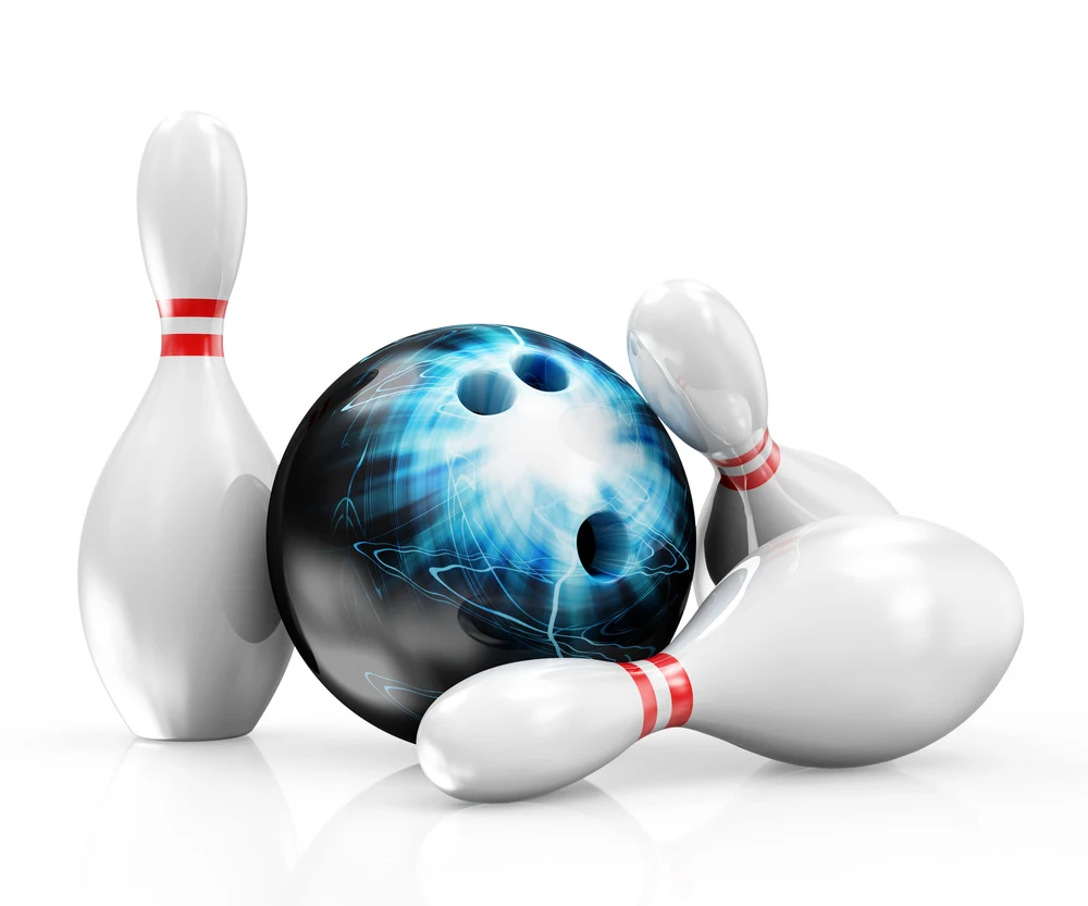 Bowling pins and blue storm bowling ball with white-colored burst