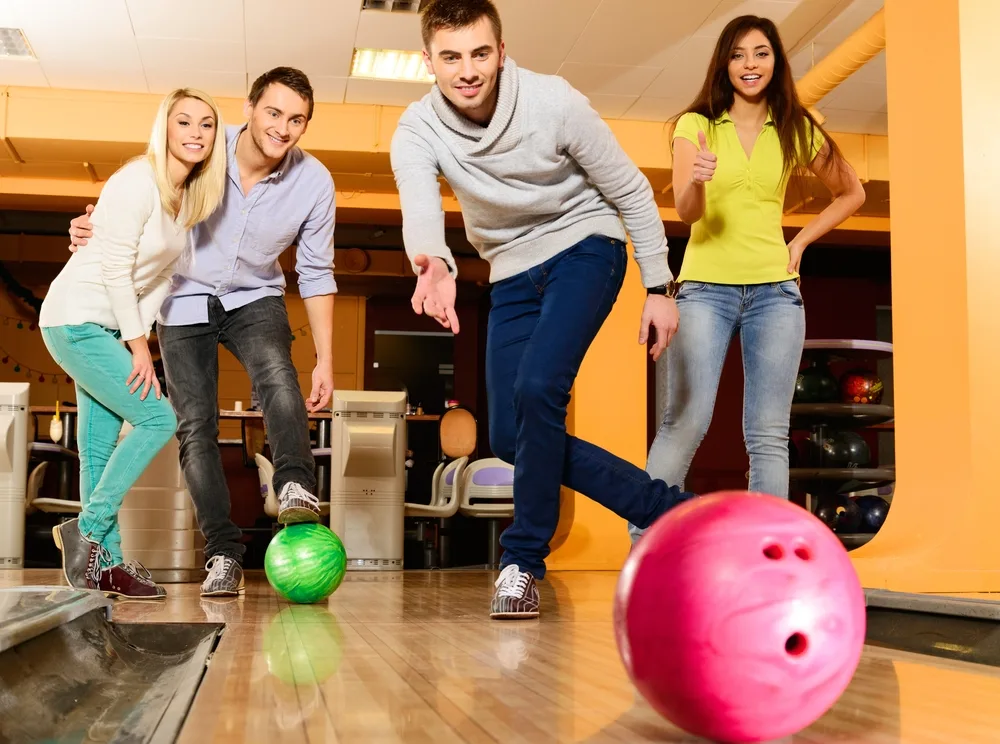 Male bowler completing match play against fellow bowler