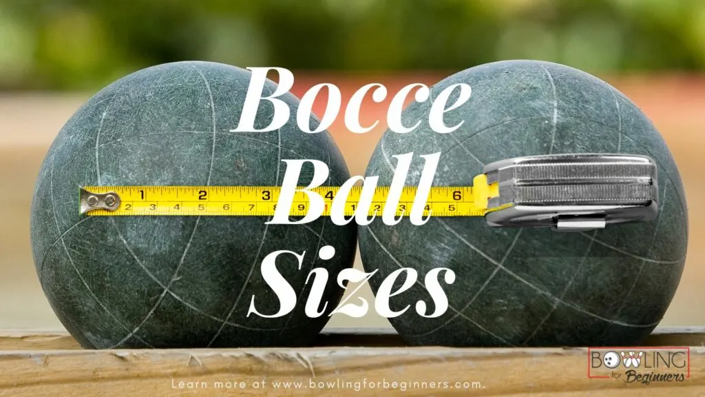 Bocce balls with a measuring tape sitting on wood post