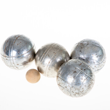 Boules on white background with little ball