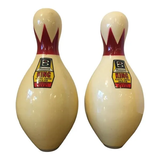 Typical duckpin bowling pins with brunswick logo