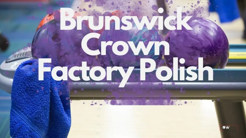 Brunswick crown factory polish in white font with purple splash of paint on ball return