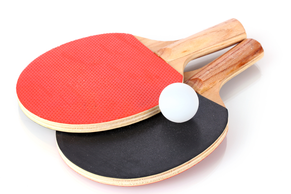 Ping-pong rackets and ball, isolated on white